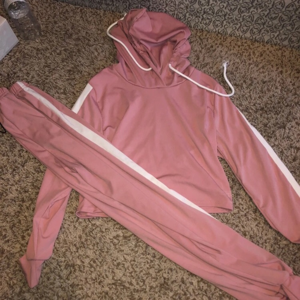Pink jump/track suit